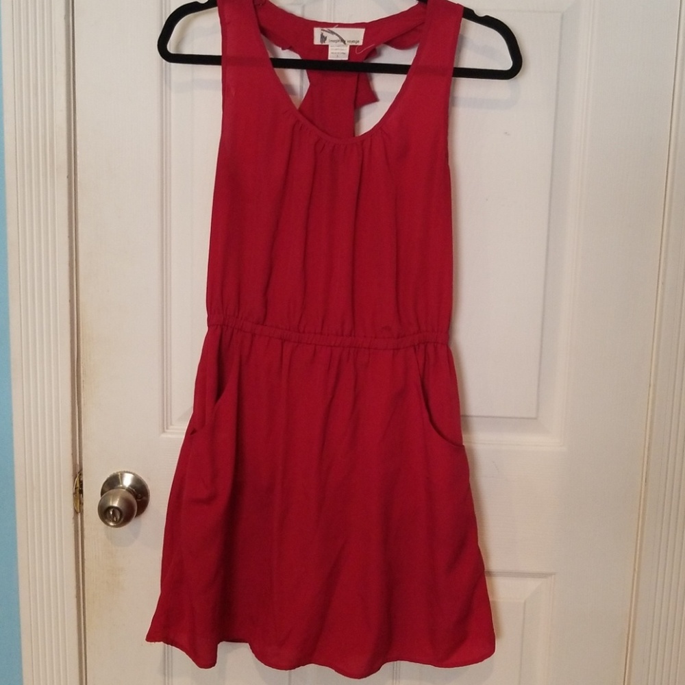 Burgundy dress with pockets and back details